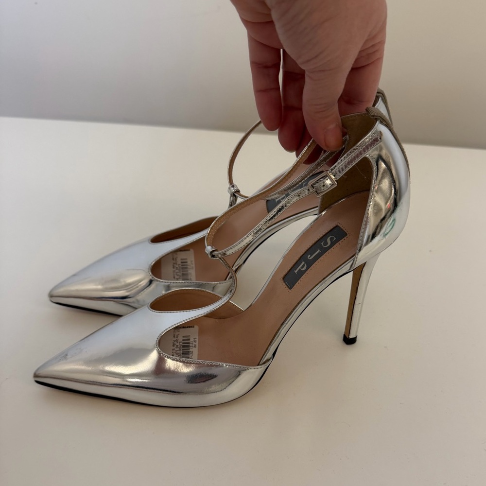 Silver SJP Patent Leather T Strap High Heel Pumps